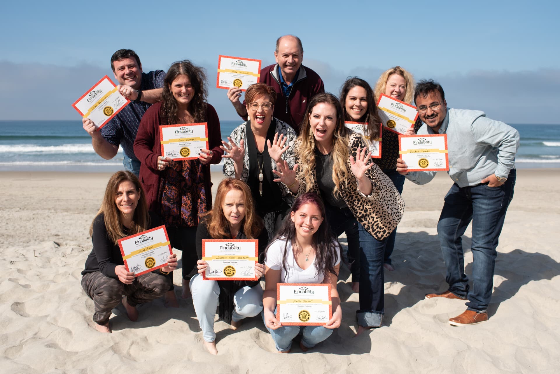 Findability University Workshop graduates holding their certificates